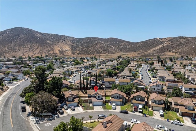 14791 Mountain High Dr, Fontana, CA 92337 - aerial perspective of suburban area with mountains