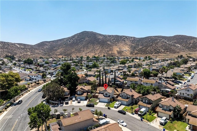 14791 Mountain High Dr, Fontana, CA 92337 - aerial perspective of suburban area with a mountainous background