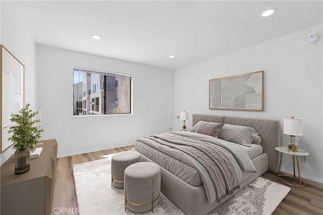 1119 Albany St Unit 226, Los Angeles, CA 90015 - bedroom with wood finished floors and recessed lighting
