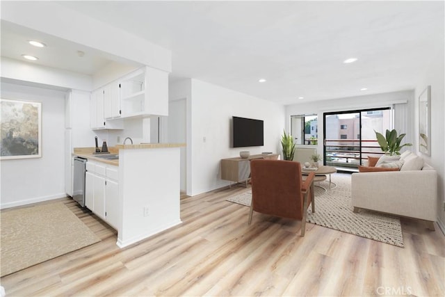 1119 Albany St Unit 226, Los Angeles, CA 90015 - living area featuring light wood-style flooring and recessed lighting