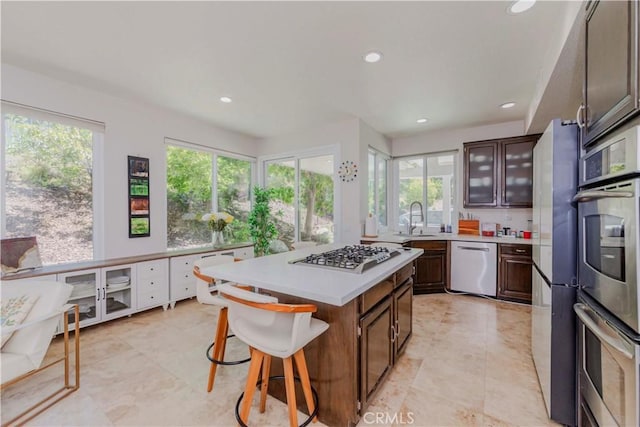 5560 Via Cantada, Yorba Linda, CA 92887 - kitchen with stainless steel appliances, plenty of natural light, light countertops, and recessed lighting
