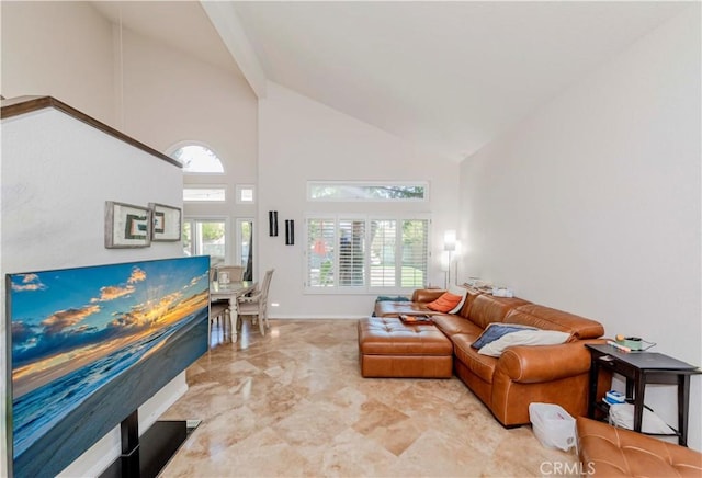 5560 Via Cantada, Yorba Linda, CA 92887 - living area featuring high vaulted ceiling, healthy amount of natural light, and light marble finish floors