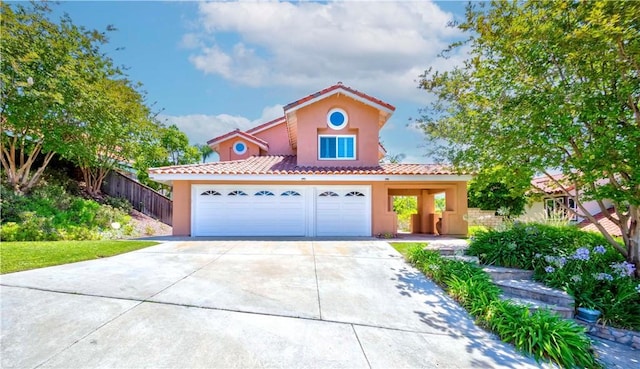 5560 Via Cantada, Yorba Linda, CA 92887 - mediterranean / spanish home with stucco siding, driveway, a tiled roof, and a garage