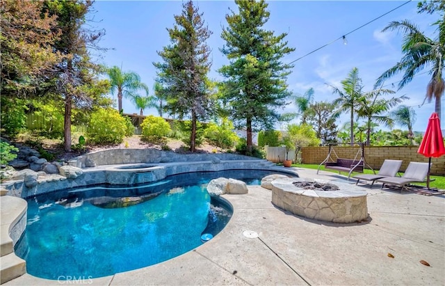 5560 Via Cantada, Yorba Linda, CA 92887 - view of pool featuring a jacuzzi, a fire pit, a fenced backyard, and a patio