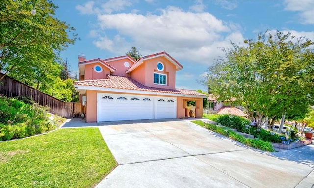 5560 Via Cantada, Yorba Linda, CA 92887 - mediterranean / spanish home with a tile roof, stucco siding, concrete driveway, a chimney, and a garage