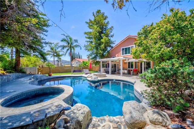 5560 Via Cantada, Yorba Linda, CA 92887 - view of pool featuring a fenced backyard, a patio, and a pool with connected hot tub