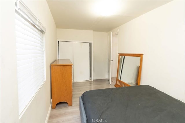 285 W 9th St, San Pedro, CA 90731 - bedroom with light wood-style flooring