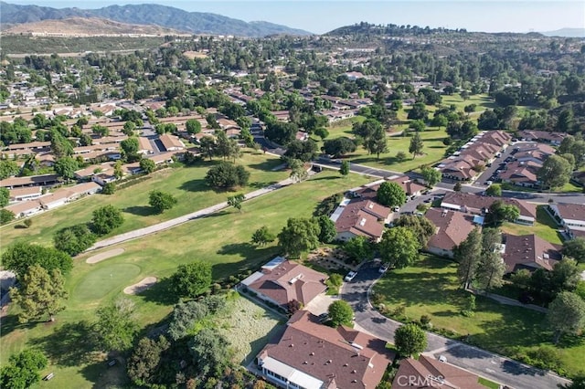 19309 Flowers Ct, Newhall, CA 91321 - aerial view of property's location featuring a mountainous background, nearby suburban area, and a local golf course