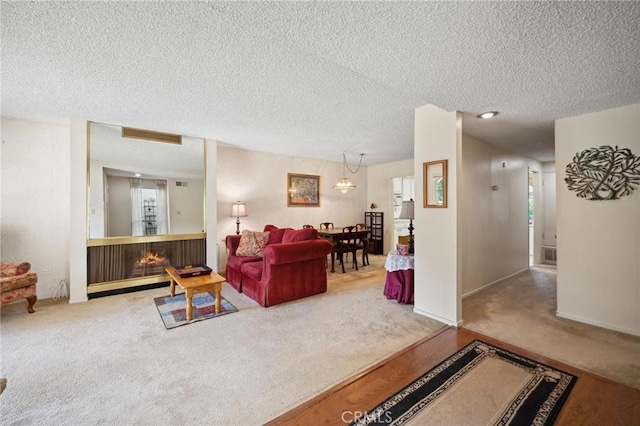 19309 Flowers Ct, Newhall, CA 91321 - carpeted living area featuring a textured ceiling