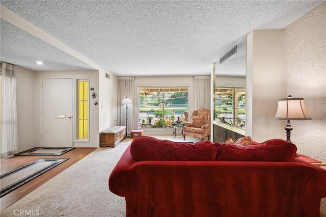 19309 Flowers Ct, Newhall, CA 91321 - living room featuring a textured ceiling