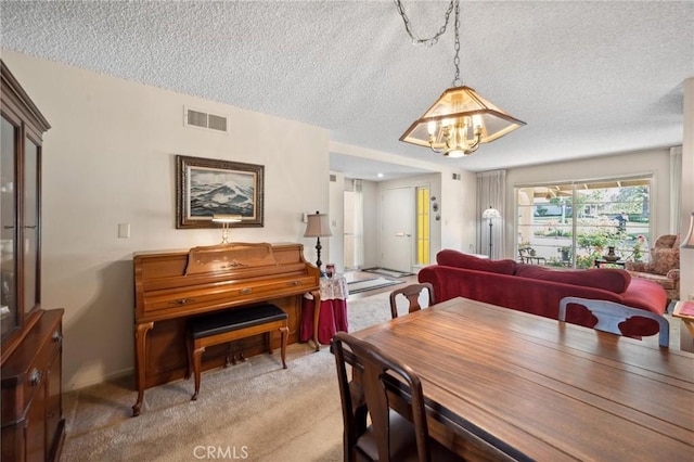 19309 Flowers Ct, Newhall, CA 91321 - dining room featuring a textured ceiling, a chandelier, and light colored carpet