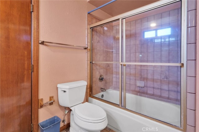 7390 Chase Ave, Hesperia, CA 92345 - full bath featuring toilet and shower / bath combination with glass door