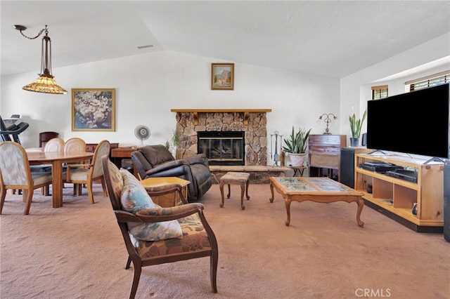 7390 Chase Ave, Hesperia, CA 92345 - carpeted living room featuring vaulted ceiling and a stone fireplace