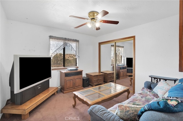 7390 Chase Ave, Hesperia, CA 92345 - living area featuring light colored carpet and a ceiling fan