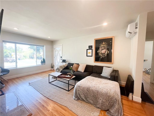 4574 Whaley Ave, Long Beach, CA 90807 - living area with a wall mounted AC, light wood-style flooring, and recessed lighting