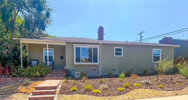 4574 Whaley Ave, Long Beach, CA 90807 - view of front of home featuring a chimney, stucco siding, crawl space, and covered porch
