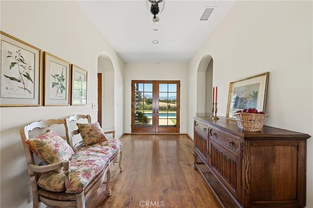 1559 Rolling Hills Rd, Santa Ynez, CA 93460 - sitting room with arched walkways, french doors, and wood finished floors