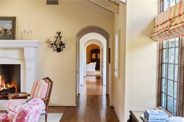 1559 Rolling Hills Rd, Santa Ynez, CA 93460 - corridor with healthy amount of natural light, wood finished floors, and arched walkways