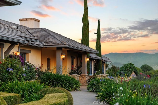 1559 Rolling Hills Rd, Santa Ynez, CA 93460 - view of side of home with stucco siding and a mountain view
