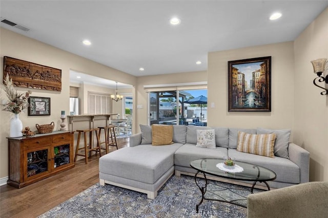 1372 W Sepulveda St, San Pedro, CA 90732 - living room featuring wood finished floors, recessed lighting, and a chandelier
