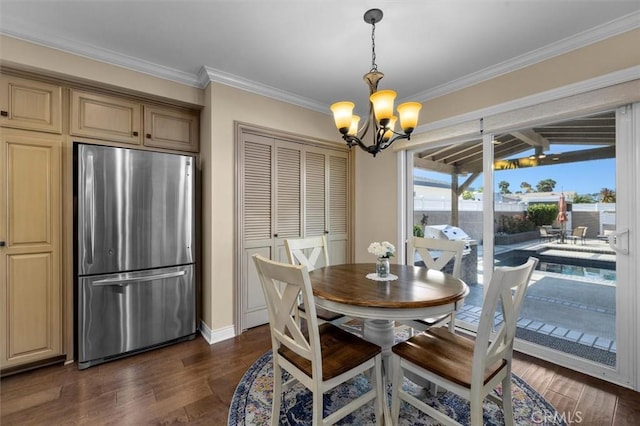 1372 W Sepulveda St, San Pedro, CA 90732 - dining space with a chandelier, ornamental molding, and dark wood-type flooring