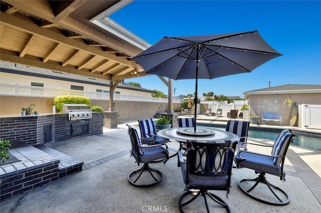 1372 W Sepulveda St, San Pedro, CA 90732 - fenced backyard featuring area for grilling, a patio, and outdoor dining space