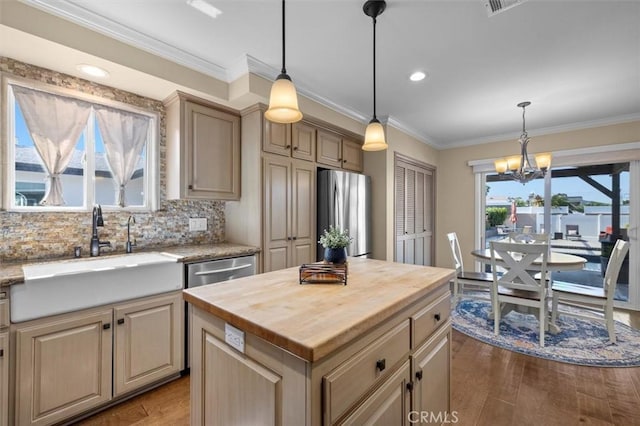 1372 W Sepulveda St, San Pedro, CA 90732 - kitchen featuring wood counters, freestanding refrigerator, wood finished floors, ornamental molding, and a chandelier