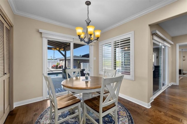1372 W Sepulveda St, San Pedro, CA 90732 - dining room featuring a chandelier, healthy amount of natural light, wood-type flooring, and crown molding