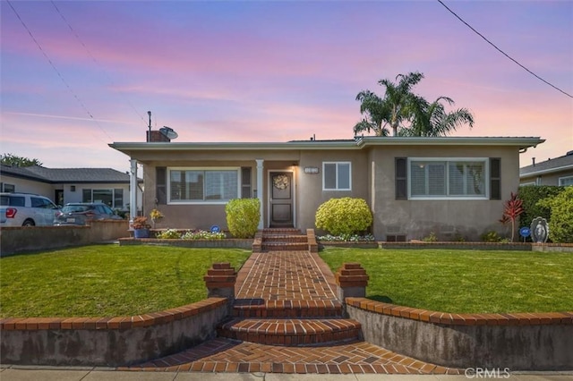 1372 W Sepulveda St, San Pedro, CA 90732 - view of front of house featuring stucco siding and a front yard
