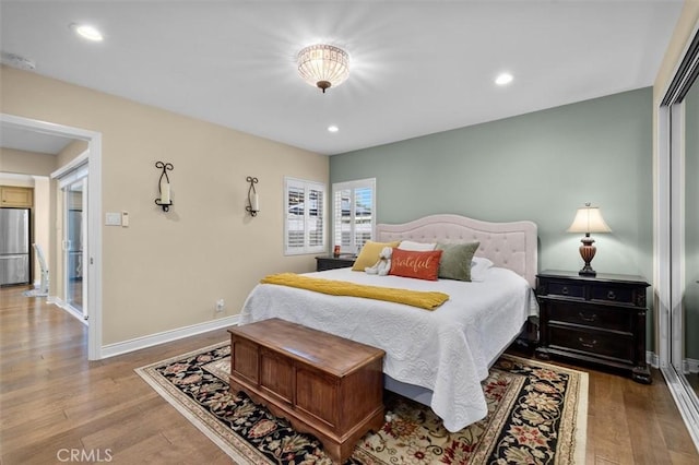 1372 W Sepulveda St, San Pedro, CA 90732 - bedroom featuring freestanding refrigerator, wood finished floors, and recessed lighting