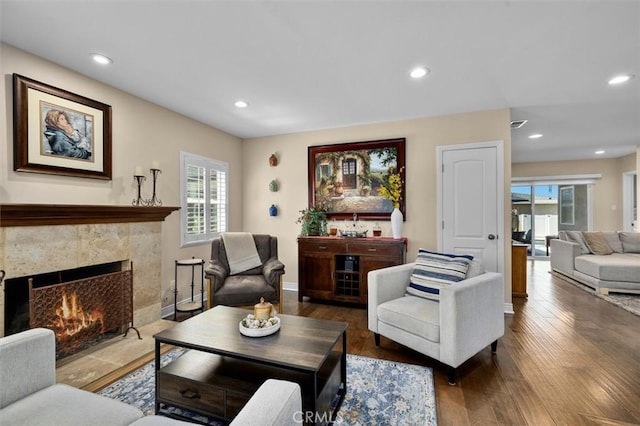 1372 W Sepulveda St, San Pedro, CA 90732 - living area featuring a high end fireplace, wood finished floors, and recessed lighting