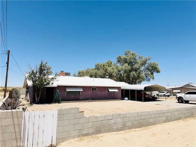 34756 Birch Rd, Barstow, CA 92311 - ranch-style house featuring a carport, a chimney, and concrete driveway
