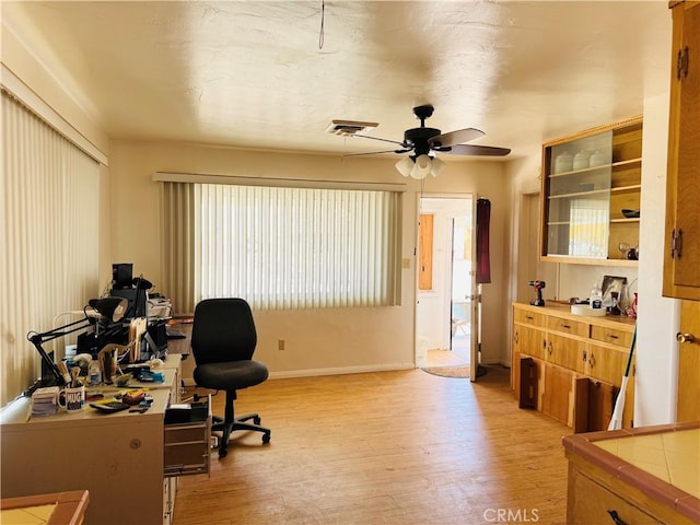 34756 Birch Rd, Barstow, CA 92311 - office space featuring light wood-style floors and ceiling fan