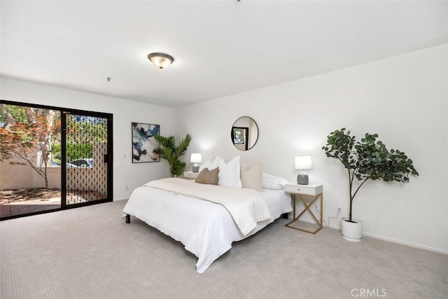 950 Cagney Ln Unit 107, Newport Beach, CA 92663 - carpeted bedroom with access to exterior