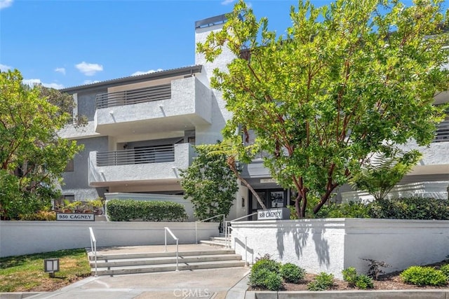 950 Cagney Ln Unit 107, Newport Beach, CA 92663 - view of front of home featuring stucco siding