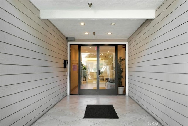 950 Cagney Ln Unit 107, Newport Beach, CA 92663 - doorway to property featuring a patio area