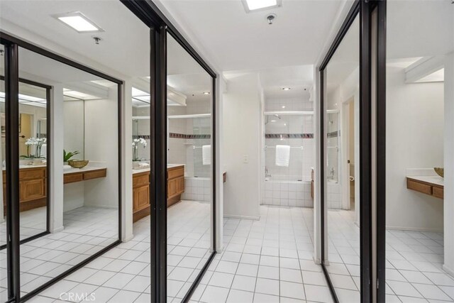 950 Cagney Ln Unit 107, Newport Beach, CA 92663 - hall featuring light tile patterned flooring