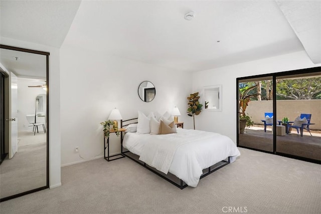 950 Cagney Ln Unit 107, Newport Beach, CA 92663 - bedroom featuring access to exterior and light carpet