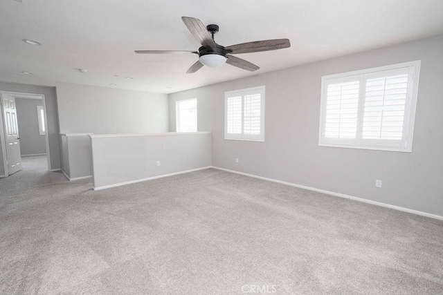 4389 Condor Ave, Fontana, CA 92336 - carpeted spare room with ceiling fan and baseboards