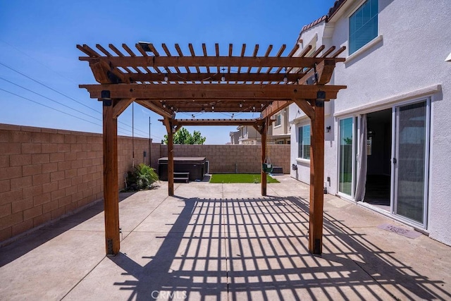 4389 Condor Ave, Fontana, CA 92336 - fenced backyard featuring a hot tub, a patio area, and a pergola
