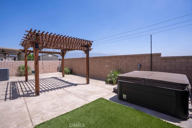 4389 Condor Ave, Fontana, CA 92336 - fenced backyard with a hot tub, a patio, and a pergola