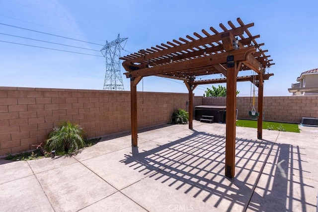 4389 Condor Ave, Fontana, CA 92336 - fenced backyard featuring a hot tub, a patio, and a pergola