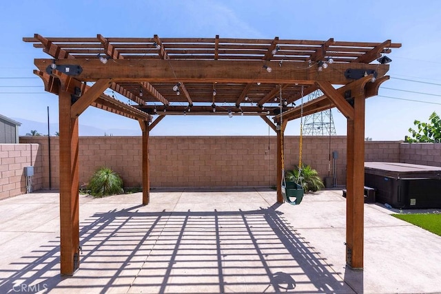 4389 Condor Ave, Fontana, CA 92336 - fenced backyard with a hot tub, a pergola, and a patio