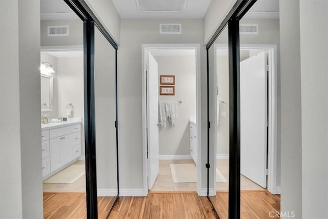 12 Sparrow Hill Ln, Laguna Hills, CA 92653 - hallway with light wood finished floors
