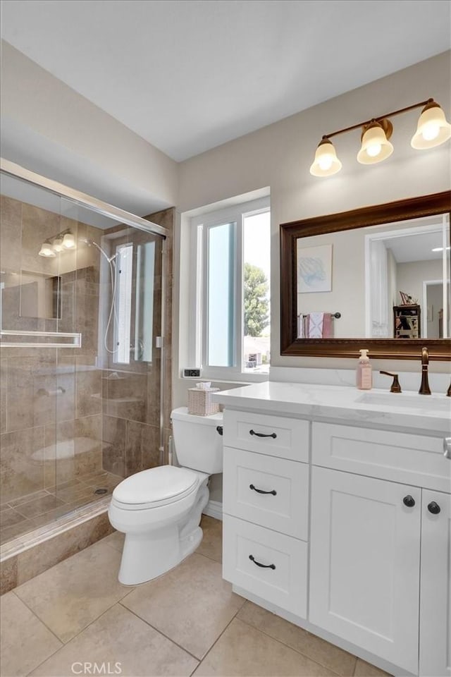 12 Sparrow Hill Ln, Laguna Hills, CA 92653 - bathroom featuring vanity, a shower stall, and tile patterned flooring