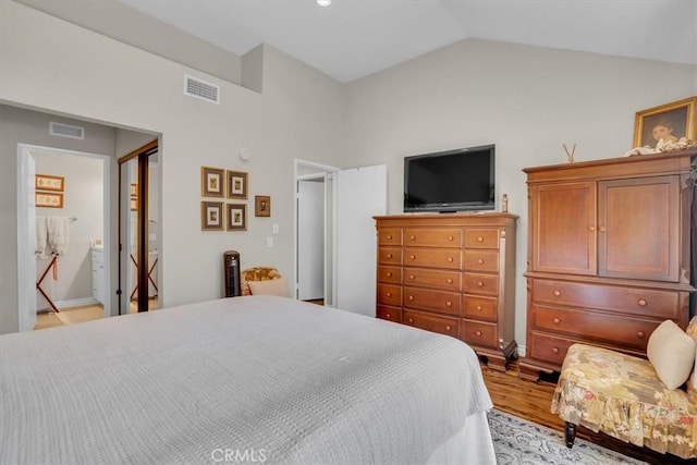 12 Sparrow Hill Ln, Laguna Hills, CA 92653 - bedroom featuring wood finished floors and lofted ceiling