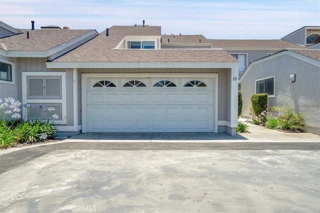 12 Sparrow Hill Ln, Laguna Hills, CA 92653 - garage with concrete driveway