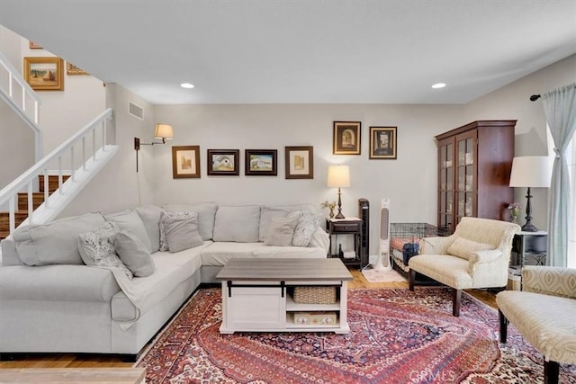 12 Sparrow Hill Ln, Laguna Hills, CA 92653 - living area featuring wood finished floors, stairway, and recessed lighting