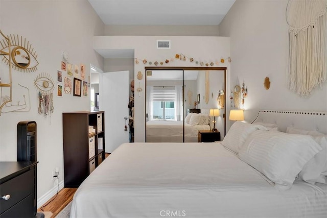 12 Sparrow Hill Ln, Laguna Hills, CA 92653 - bedroom featuring wood finished floors and a closet