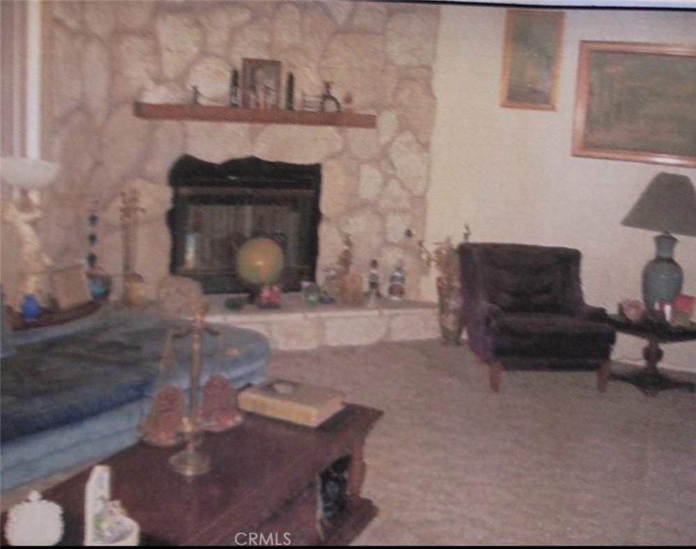 16082 Aztec Rd, Apple Valley, CA 92307 - living room with a fireplace